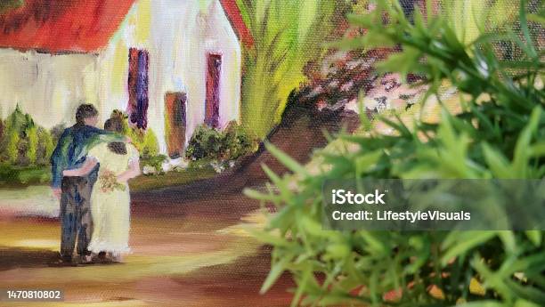 Green Shrub In Foreground Couple In Background In Soft Focus Church Or School Building Reminiscent Of Times Gone By Stock Photo - Download Image Now