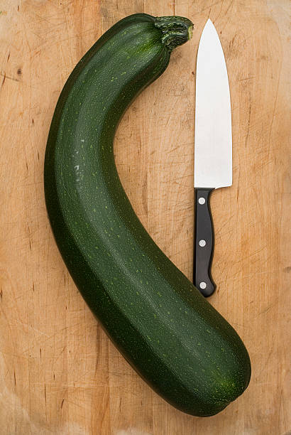 Zucchini and Knife stock photo