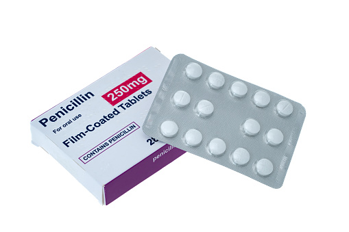 A box of Penicillin antibiotic pills with a blister pack - white background