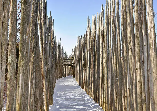 palisades of a reconstructed Iroquois village, Winter