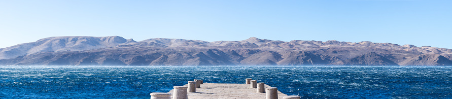 Pier in Karlobag Croatia, Wavy sea