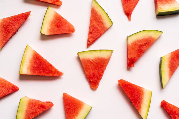istock Flat lay Pattern with pieces of fresh juicy Watermelon isolated on white background 1470816015