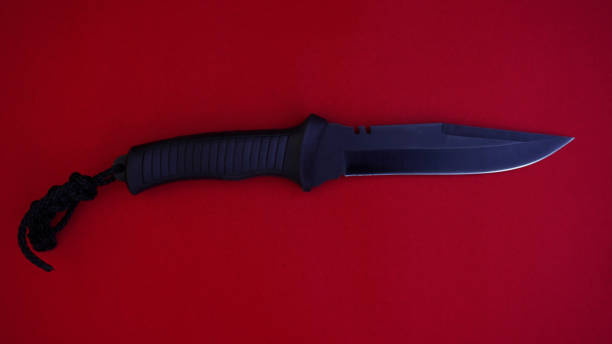 istock American military combat knife on a red background 1470817022