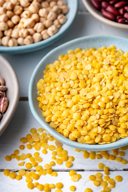 istock Different types of legumes in bowls - yellow lentils 1470821327
