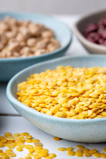 istock Different types of legumes in bowls - yellow lentils 1470821336