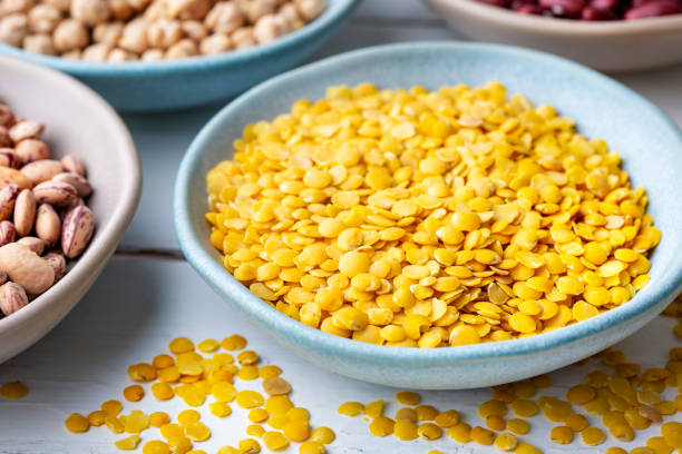 istock Different types of legumes in bowls - yellow lentils 1470821342
