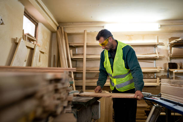 istock Mature carpenter working on a piece of wood 1470822500