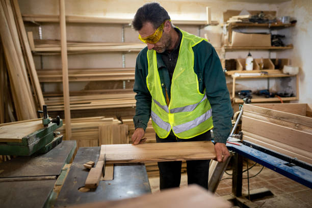 istock Mature carpenter working on a piece of wood 1470822695