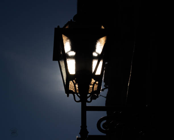 istock Street lamp lighted by the sun 1470823082