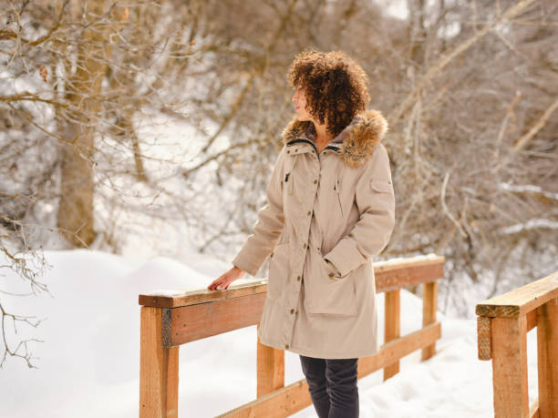 istock Young Woman Hking in Winter 1470823353