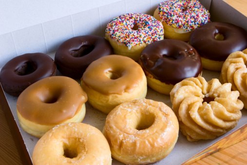 box of donuts - chocolate glazed, maple, sprinkles, honey cruller, traditional