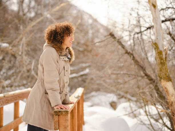 istock Young Woman Hking in Winter 1470823903