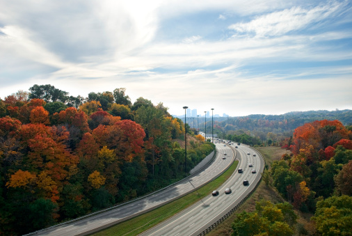 Travelling into the city on a highway during autumn. Picture taken in Toronto.