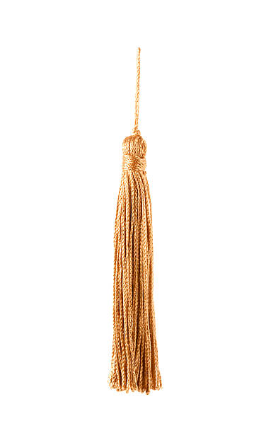 golden knot top tassel golden knot top tassel isolated on white background tassel stock pictures, royalty-free photos & images