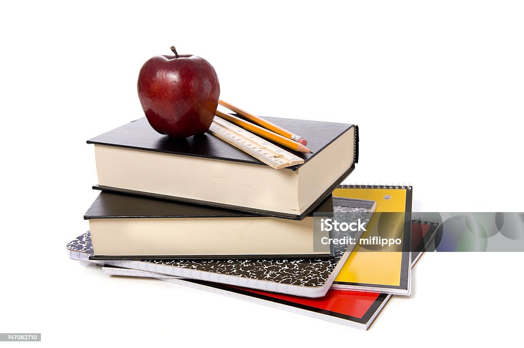 Os livros escolares com maçã - Foto de stock de Livro didático royalty-free