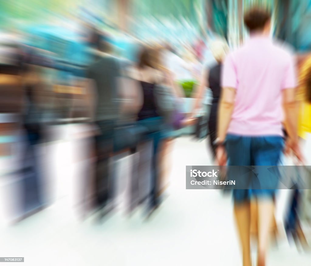 People rush on crowded street People rush on crowded street. Motion blur Adult Stock Photo