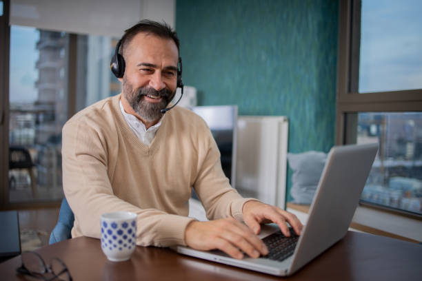 istock Mature fashionable man working at home 1470831515