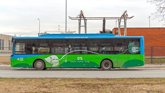 Modern and green bus in the center of the Swedish city Malmö
