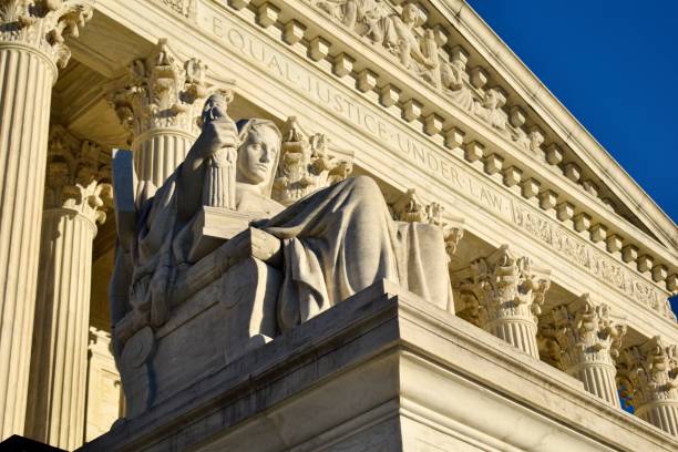 Contemplation of Justice at the Supreme Court of the United States The contemplation of justice statue outside the Supreme Court us supreme court building stock pictures, royalty-free photos & images