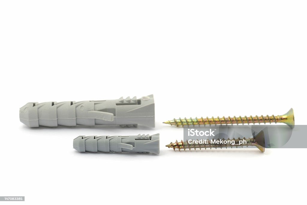 screw and plastic dowel screw and plastic dowel on white Bolt - Fastener Stock Photo