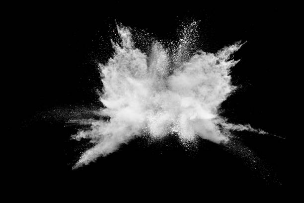 istock White powder explosion isolated on black background.White dust particles splash. 1470833853