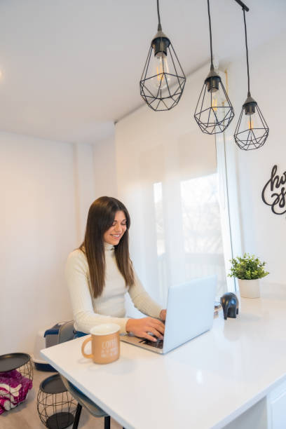 istock Businesswoman working with a computer typing an email, business, home office, telecommuting 1470834159