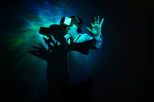 istock A woman wearing virtual reality glasses 1470835035