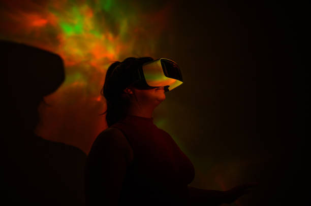 istock A woman wearing virtual reality glasses 1470835074