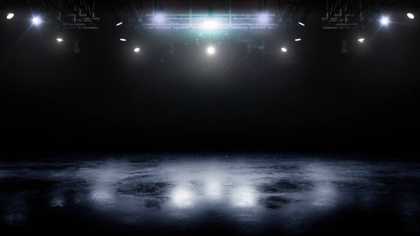 istock Blue ice floor texture and mist. Snow and ice background. Empty ice rink illuminated by spotlights. Scene Illumination 1470835974