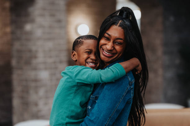 istock Loving young mom embracing her preschool age son 1470837202