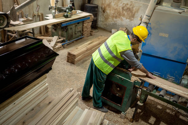 istock Carpenter making a wooden coffin 1470837787