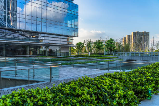istock beautiful green meadow near modern office building 1470840156
