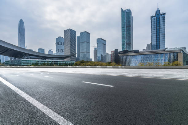 istock empty urban road with modern building in the city 1470840185