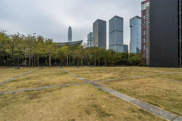 istock buildings and green lawn 1470840186