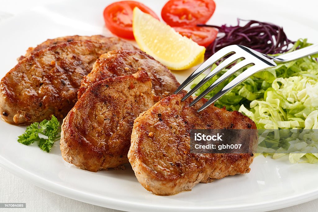 Grilled steaks Grilled steak with vegetables Barbecue - Meal Stock Photo