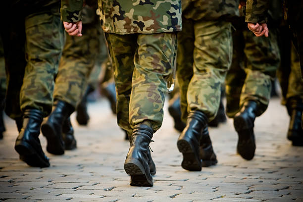 istock Soldiers march in formation 147084318