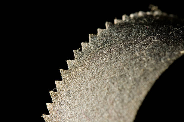 Dusty old saw blade stock photo