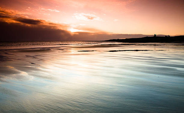 Cтоковое фото Dunstanburgh Замок