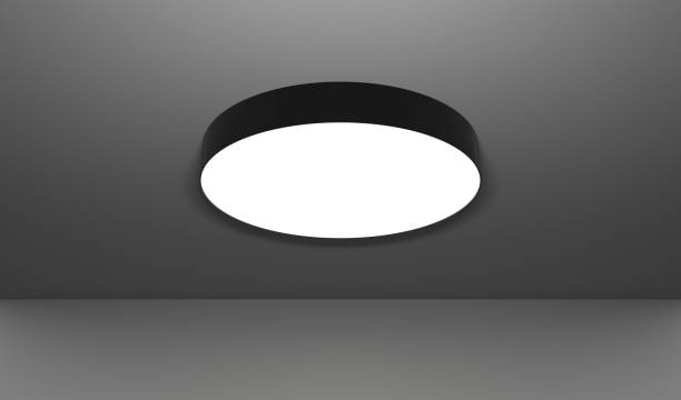 istock Modern round ceiling lamp, overhead electric light 3d render. Realistic interior room with black metal cylinder chandelier at night, luminaire for home or office on dark background 1470846608