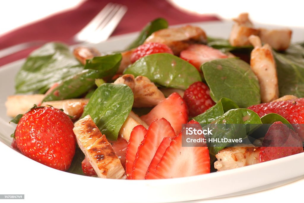 Spinach and strawberry salad Fresh spinach and strawberry salad with grilled chicken Strawberry Stock Photo