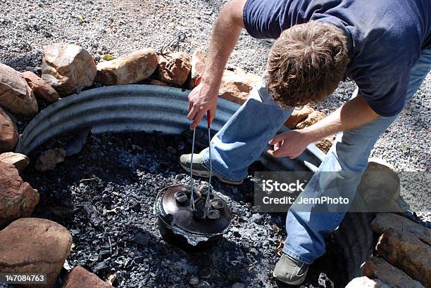 Dutch Oven Cooking Stock Photo - Download Image Now - Adult, Autumn, Bending