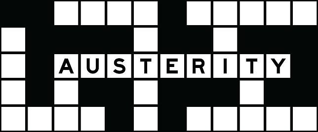Alphabet letter in word austerity on crossword puzzle background