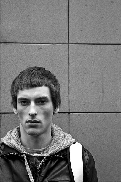 istock Young man near the wall 147084957