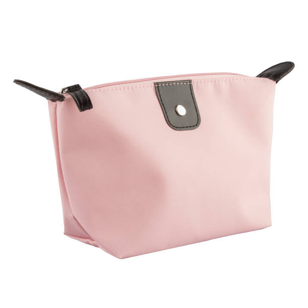 istock Stylish bright pink cosmetic bag on a white background. 1470851662