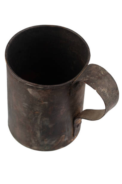 istock Antique army vintage brass mug isolated on a white 1470851666