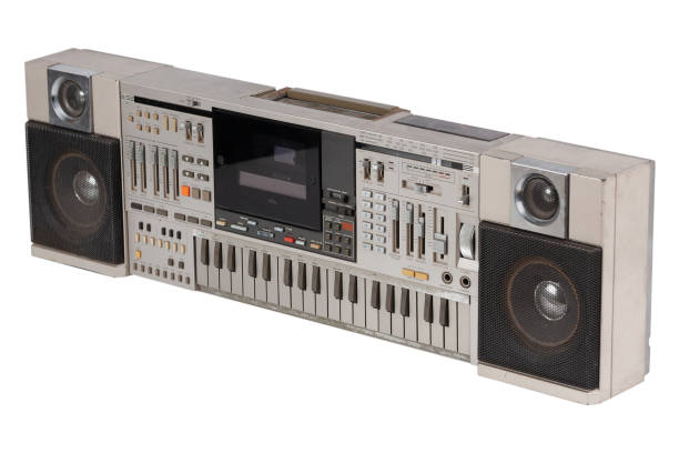 istock Retro rusty vintage portable stereo cassette recorder from 80s isolated on white. 1470851773