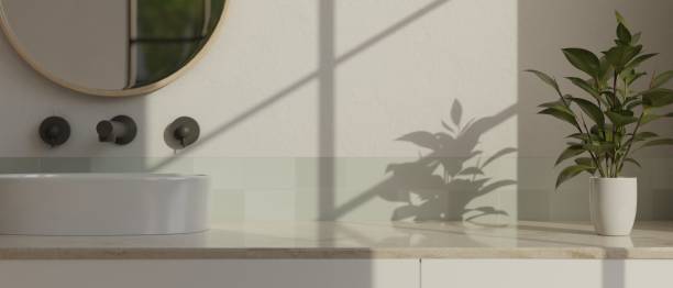 istock Close-up image of copy space on modern white bathroom counter with ceramic sink 1470854286