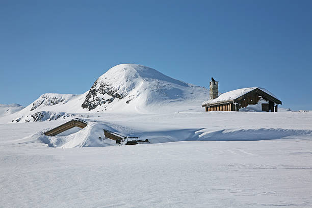 Cabin in the high mountains stock photo