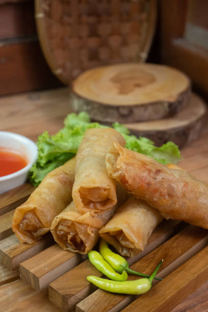 istock Selective focus on the lumpia or lunpia is a typical snack from Java in Indonesia, in English it is often called spring rolls, soft focus 1470859694