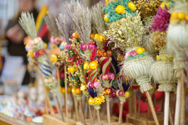 Traditional Lithuanian Easter palms known as verbos sold on Easter market in Vilnius. Lithuanian capital's annual traditional crafts fair is held every March on Old Town streets. stock photo